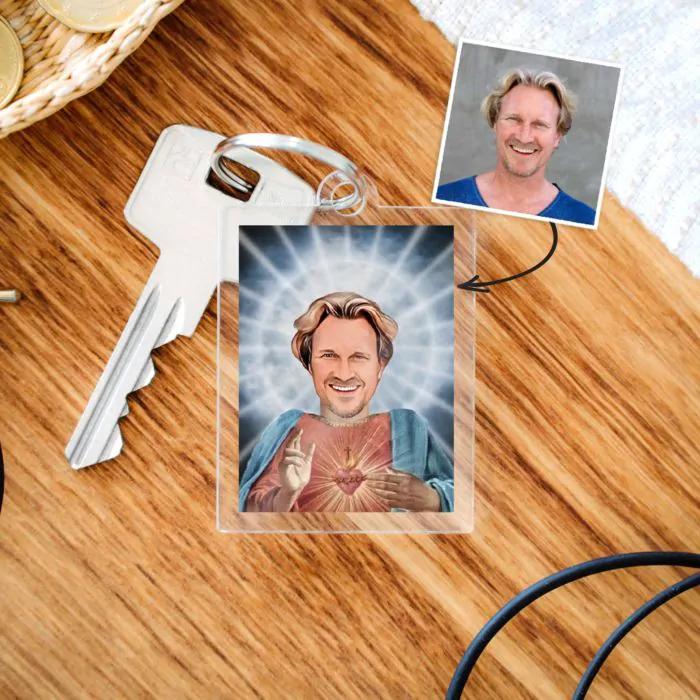 Porte-clés personnalisé en acrylique avec visage d'homme sur un corps de saint et une auréole