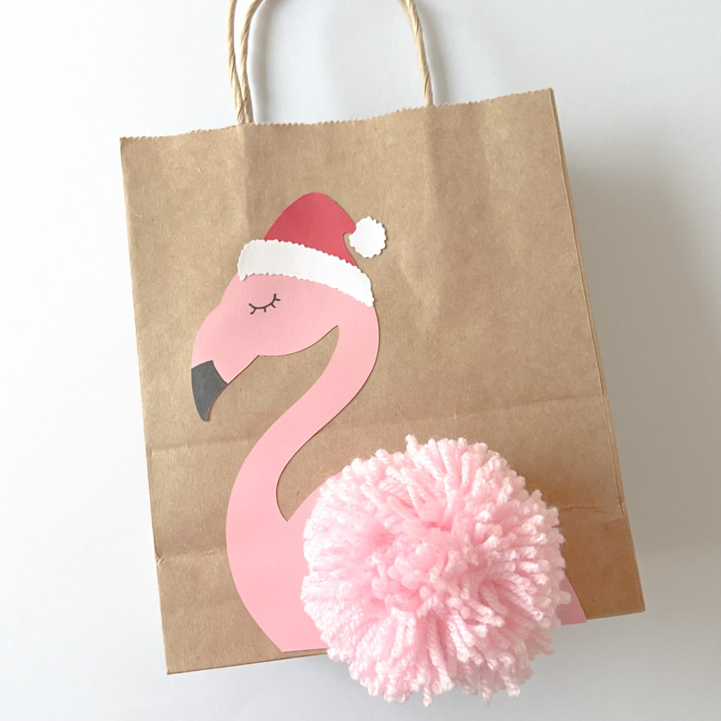 pochette cadeau avec flamant rose et pompon