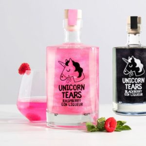 Bouteille de gin avec gin rose avec paillettes et licorne dessus